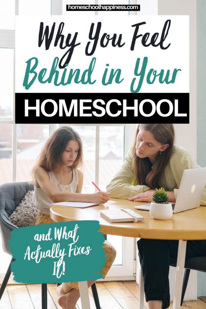 Mom and child sitting together at a kitchen table doing homeschool work, with text overlay that reads Why You Feel Behind in Your Homeschool and What Actually Fixes It, for K–3 homeschool moms feeling overwhelmed or behind.